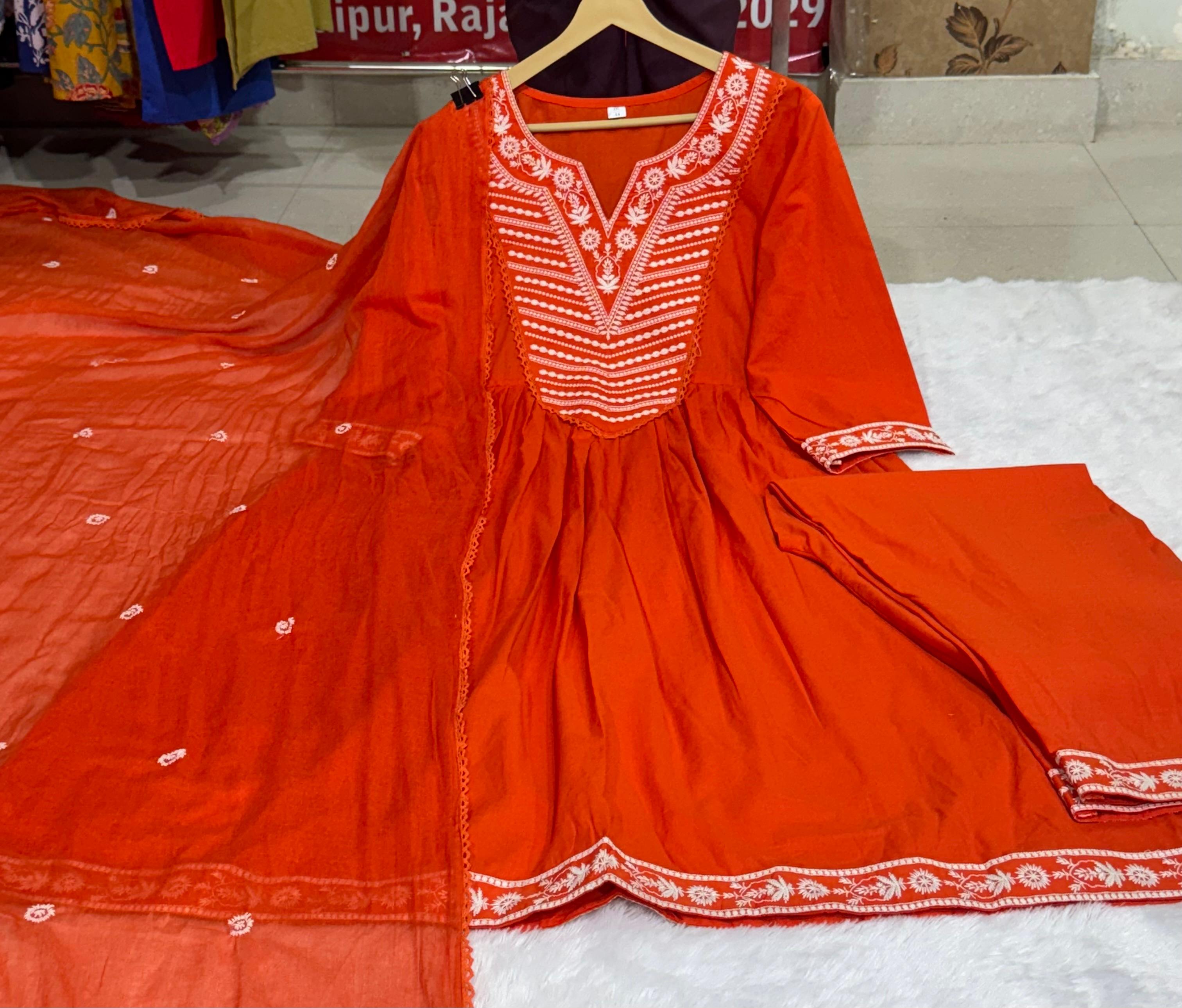 Jaipuri Women White Embroidered Panel Worked Flared Cotton Orange Color Kurta With Pant and Dupatta